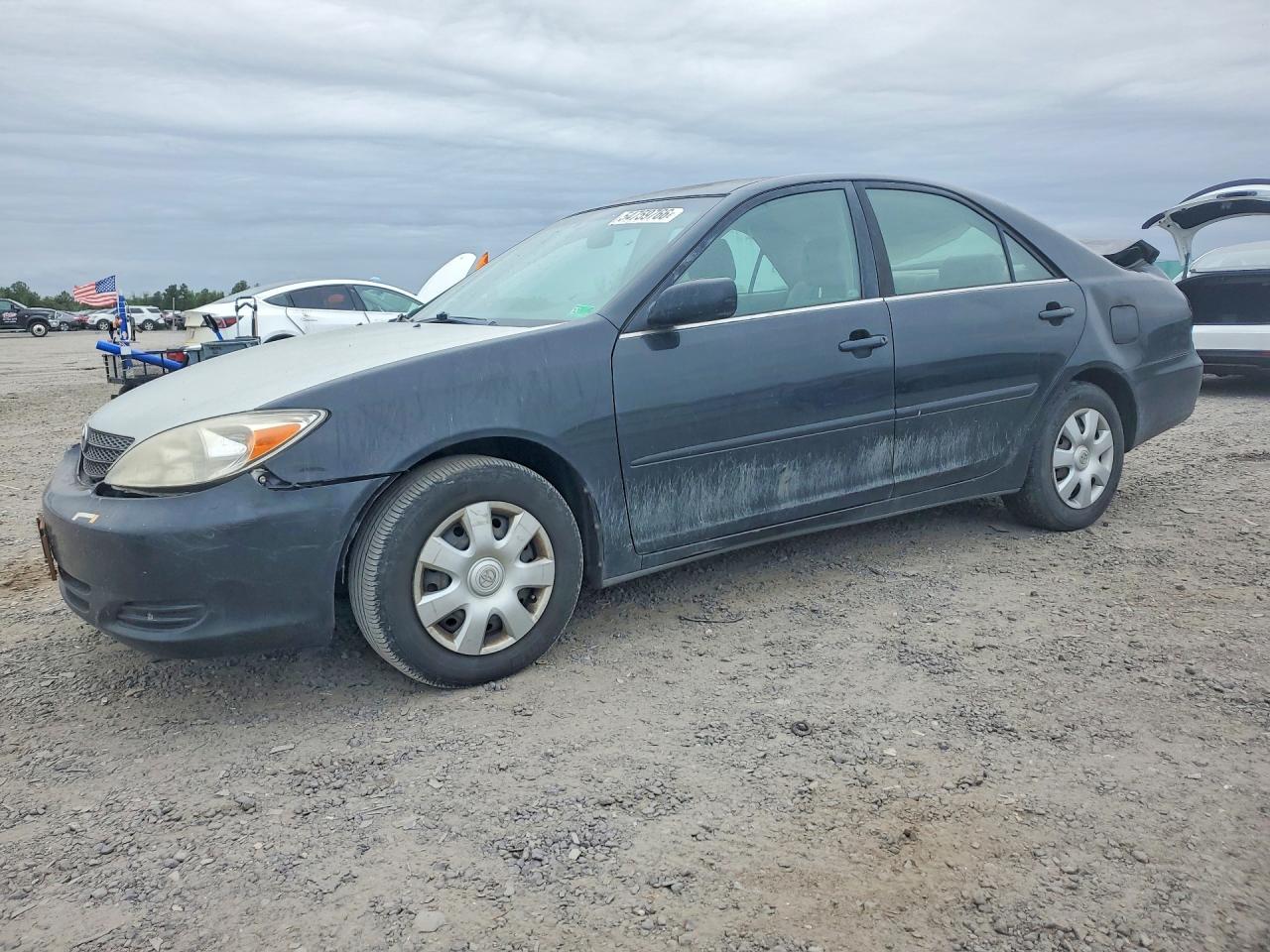 2004 Toyota Camry LE, VIN 4T1BE32KX4U310726 — Rear end