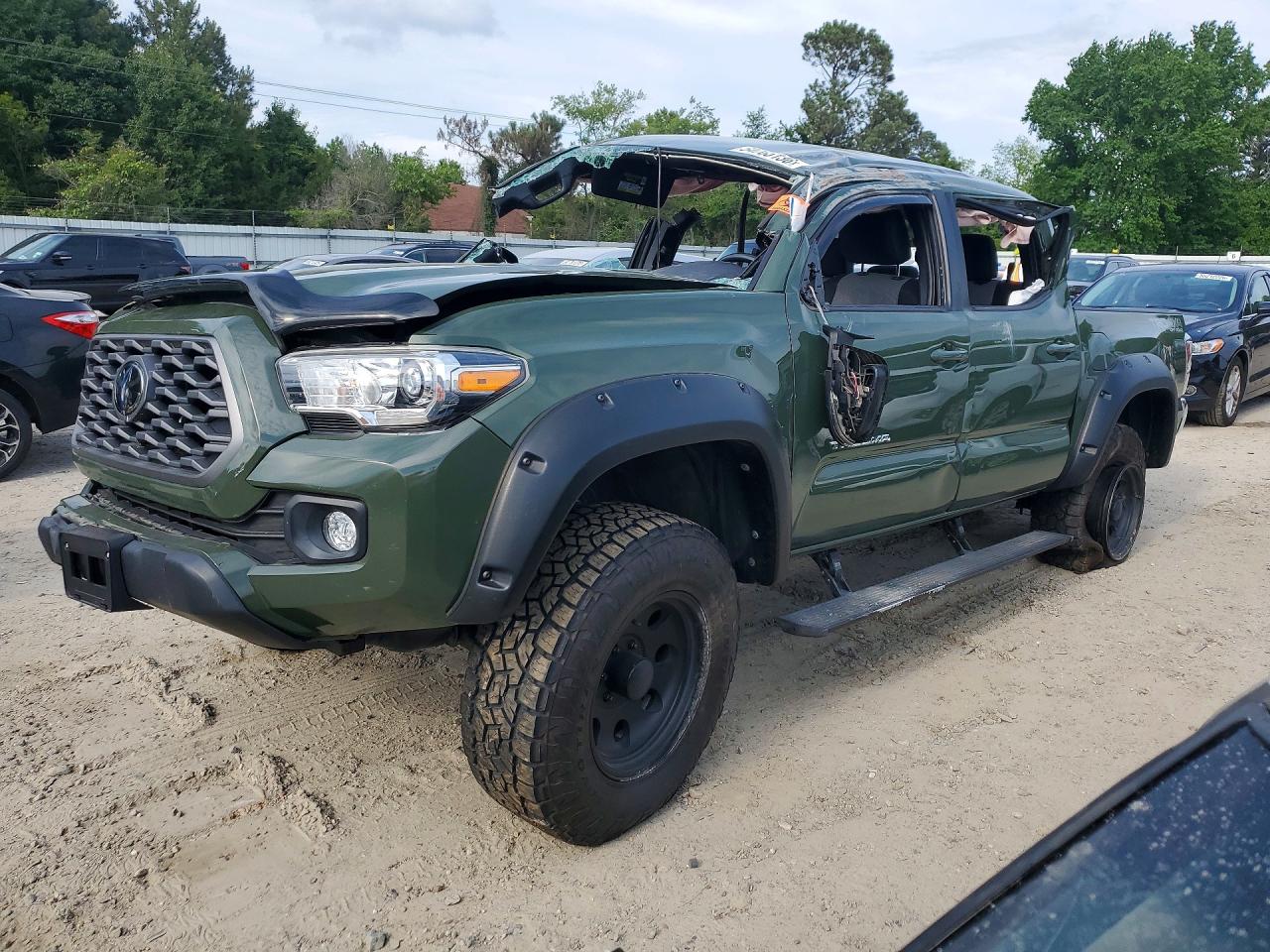 2021 Toyota Tacoma TRD Off Road, VIN 3TYCZ5ANXMT039907 — Rollover