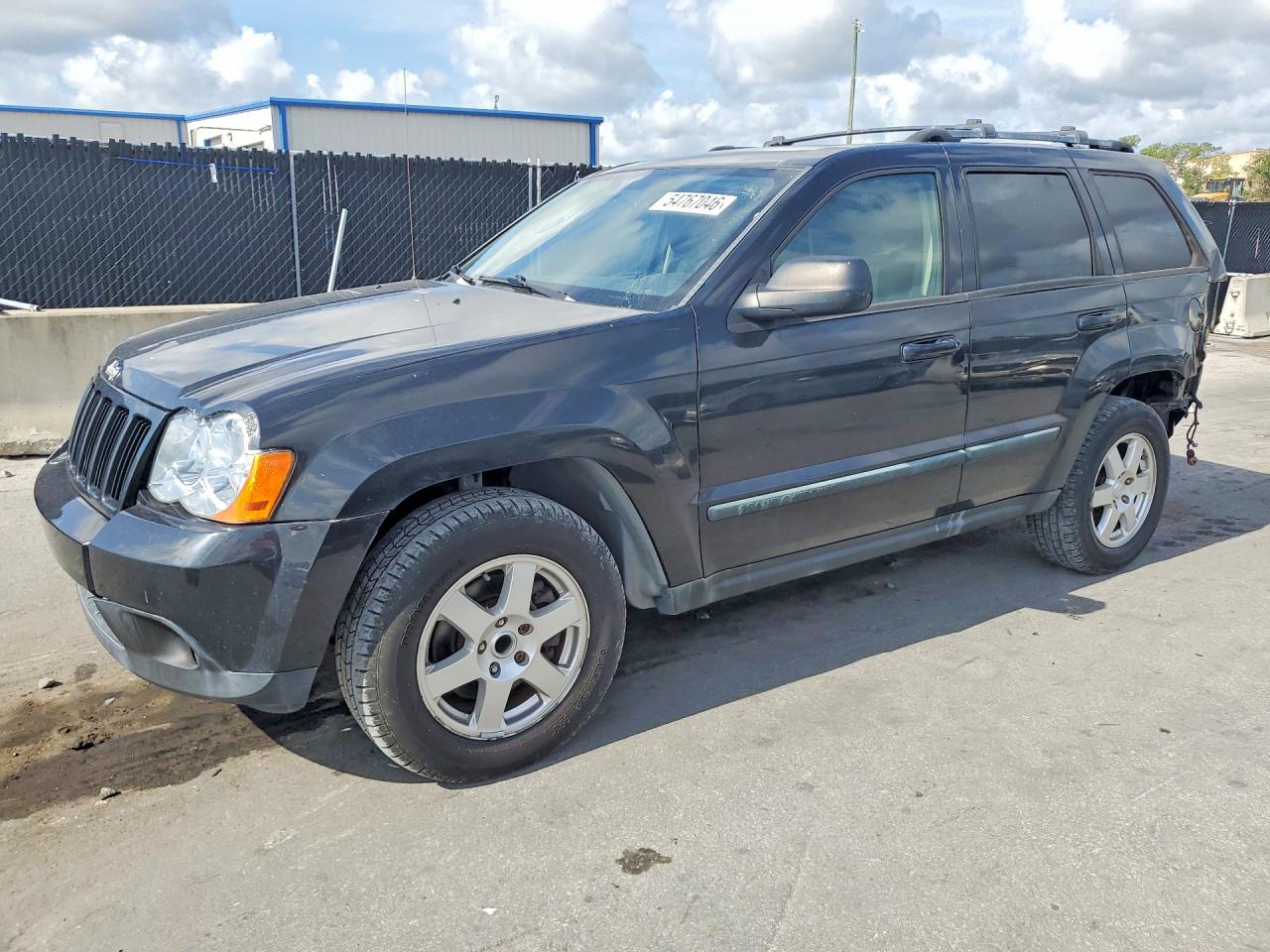 2009 Jeep Grand Cherokee Laredo, VIN 1J8GS48K09C535176 — Rear end
