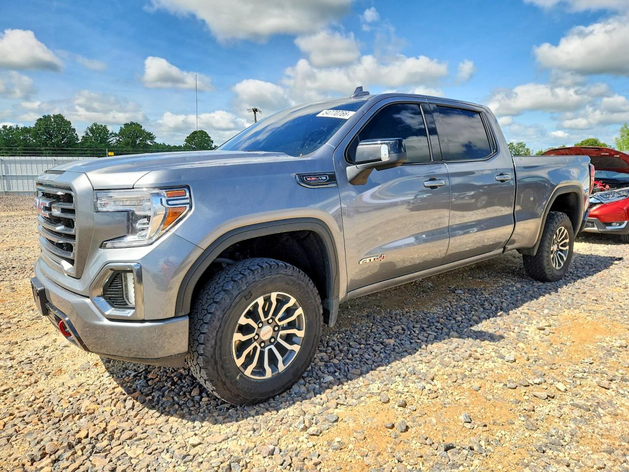 2022 GMC Sierra 1500 AT4, VIN 1GTP9EELXNZ175024 — Град