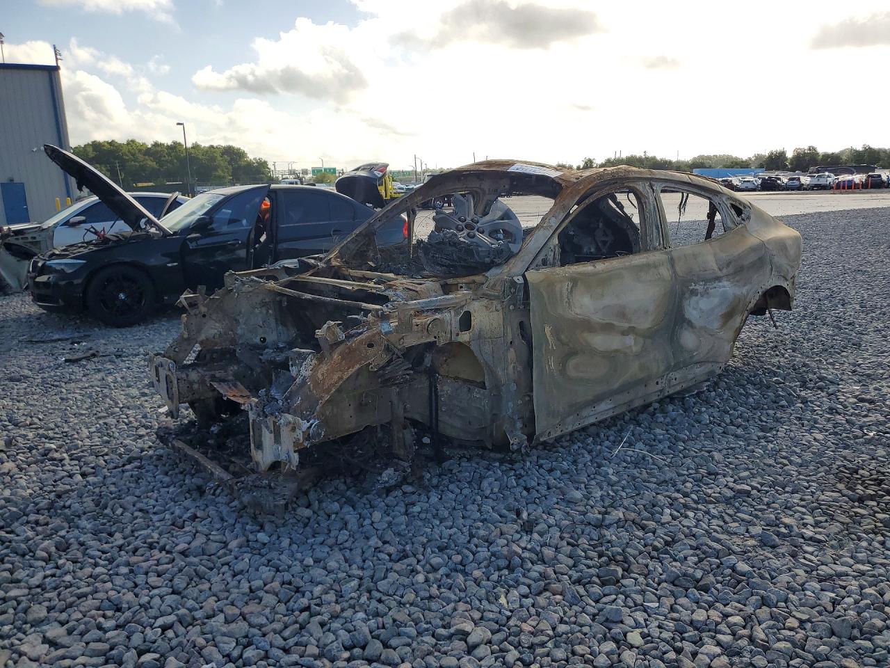 2021 Ford Mustang Mach-E Premium, VIN 3FMTK3R77MMA56136 — Burn