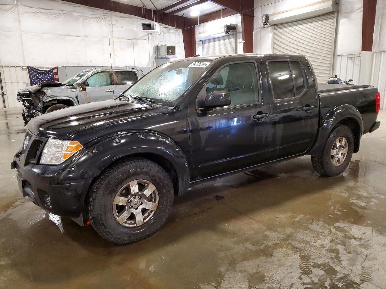 2010 Nissan Frontier Pro-4X, VIN 1N6AD0EV6AC445188 — Front end
