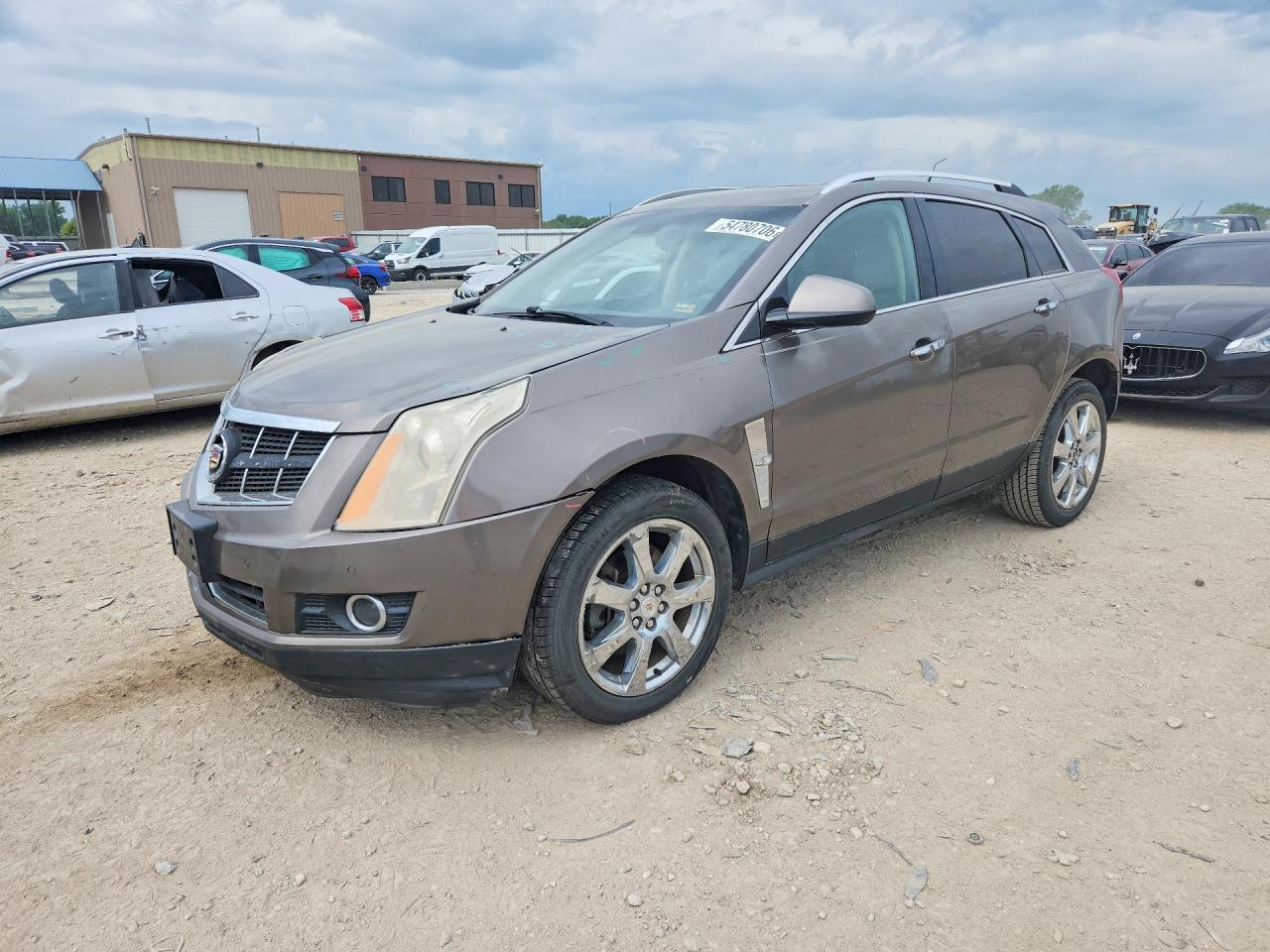 2012 Cadillac SRX Premium Collection, VIN 3GYFNCE30CS614506 — Hail