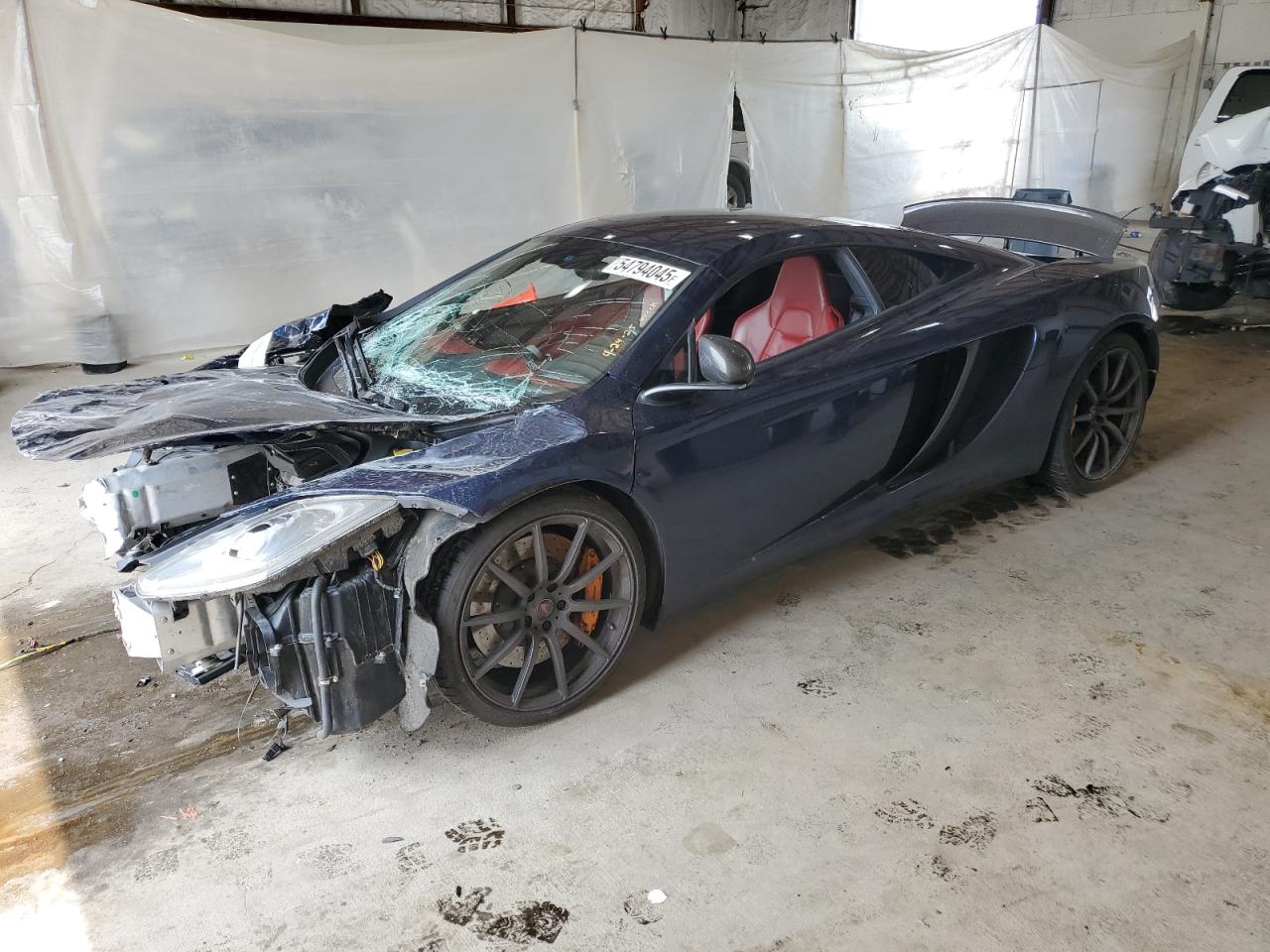 2012 McLaren MP4-12C, VIN SBM11AAA0CW001687 — Front end