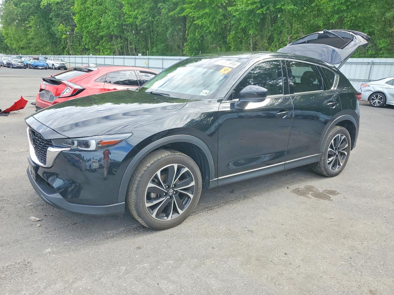 2023 Mazda CX-5 S Premium, VIN JM3KFBDM3P0243173 — Rear end