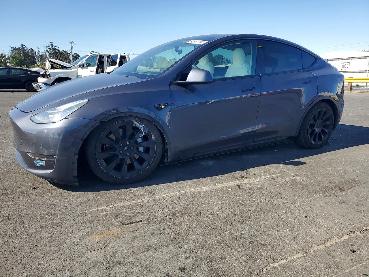 2021 Tesla Model Y Long Range, VIN 5YJYGDEE7MF197850 — Undercarriage
