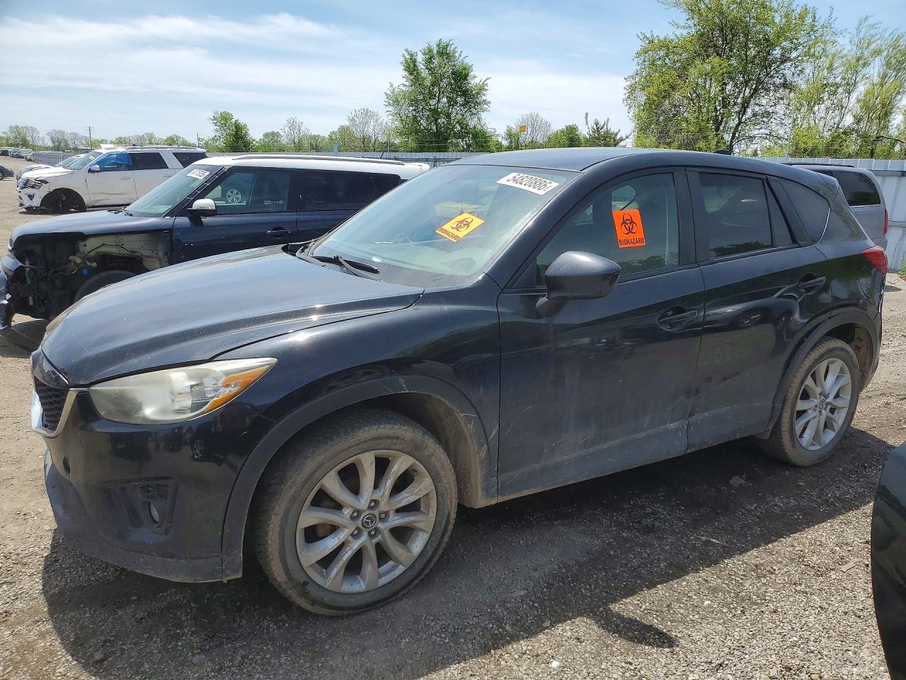2015 Mazda CX-5 Grand Touring, VIN JM3KE4DY5F0450437 — Vandalism