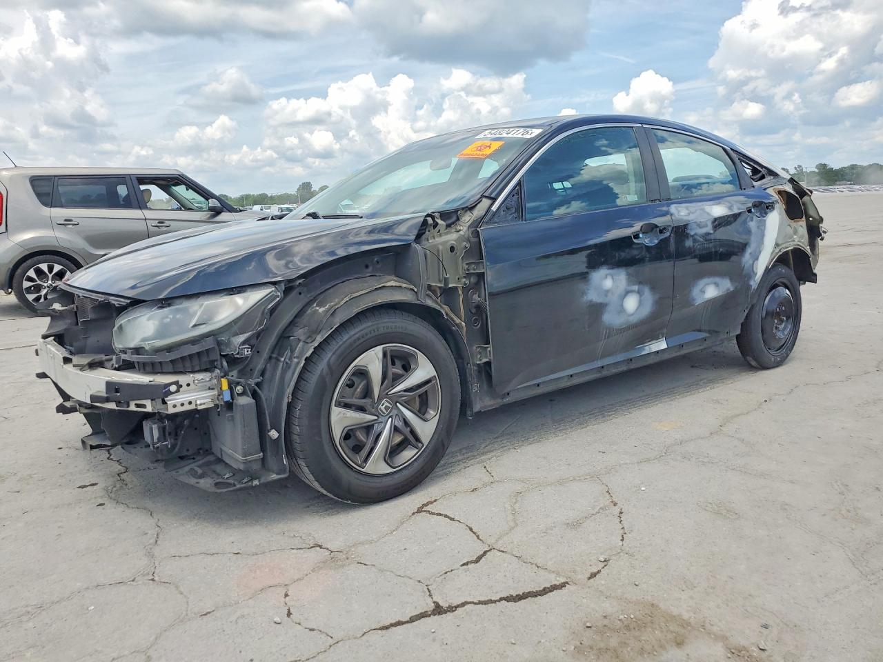 2019 Honda Civic LX, VIN 19XFC2F60KE010899 — Rejected repair