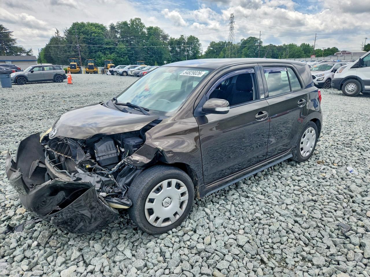2011 Scion xD, VIN JTKKU4B46B1009036 — Перед