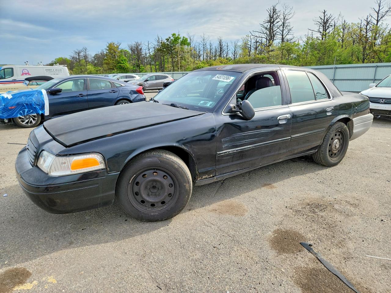 2009 Ford Police Interceptor, VIN 2FAHP71V39X116895 — Engine fire