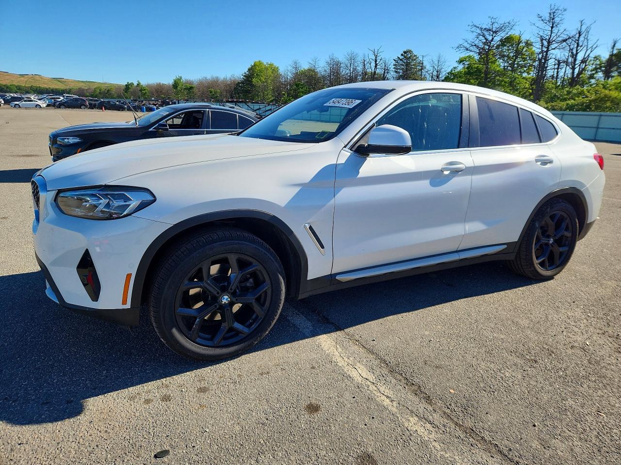 2024 BMW X4 xDrive30i, VIN 5UX33DT03R9V10857 — Зад