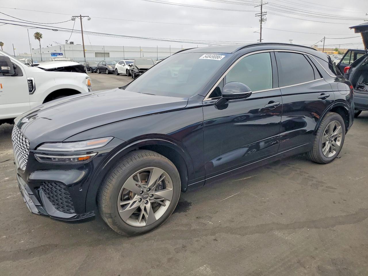2023 Genesis GV70 Sport, VIN KMUMCDTC5PU129888 — Minor dents and scratches