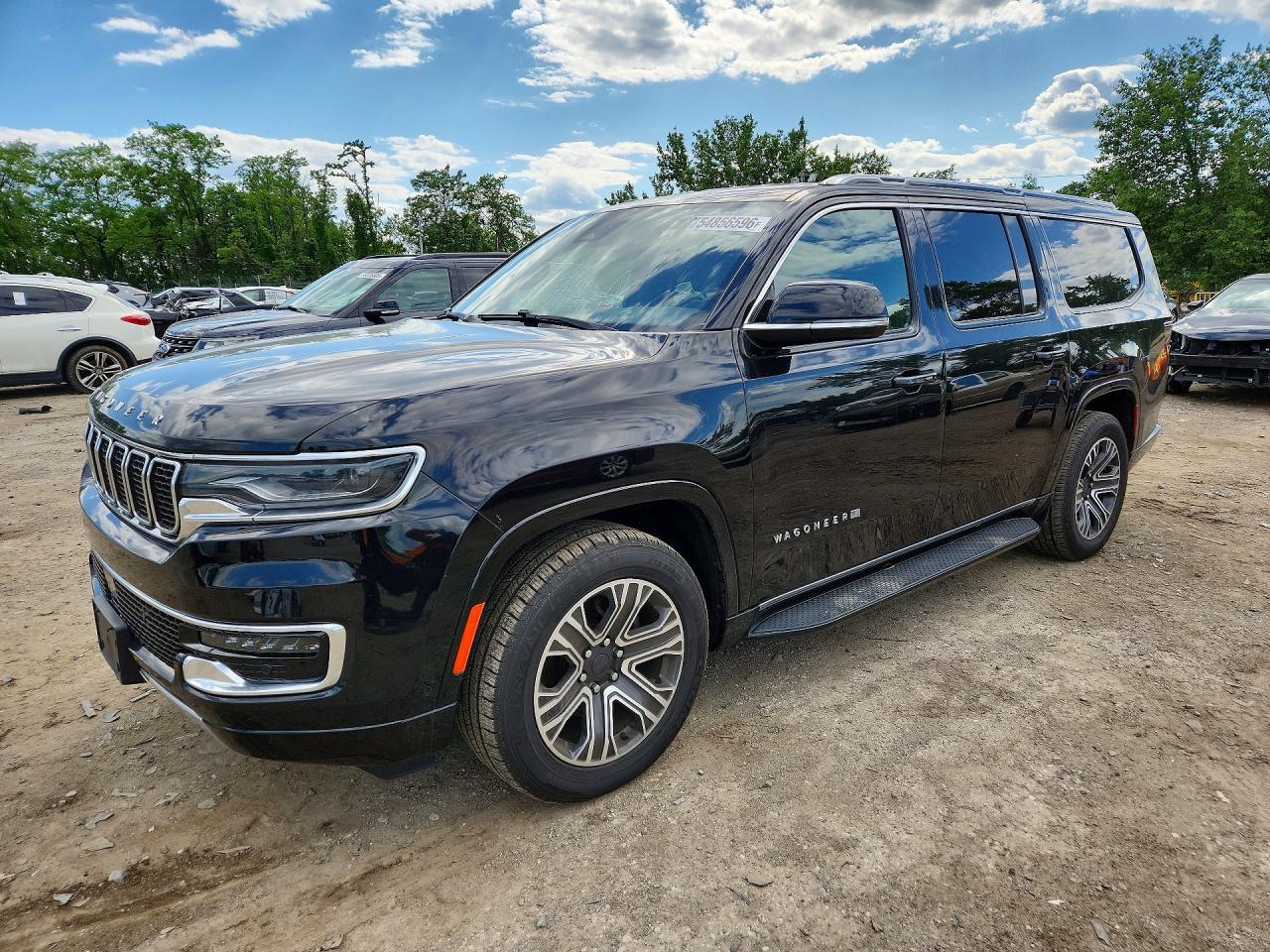 2023 Jeep Wagoneer Series II, VIN 1C4SJSBP3PS568270 — Бок