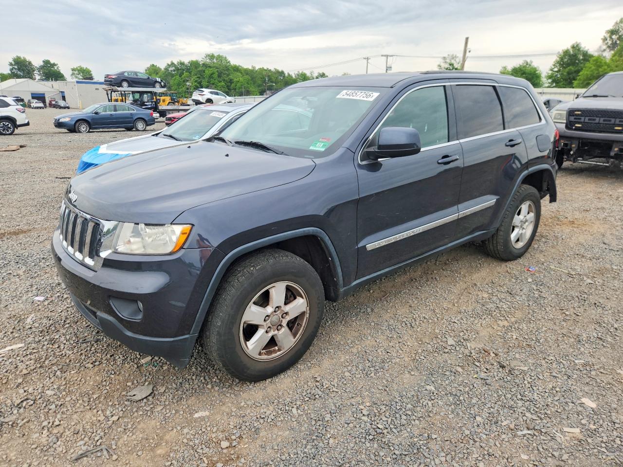 2013 Jeep Grand Cherokee Laredo, VIN 1C4RJFAG4DC633415 — Rear end