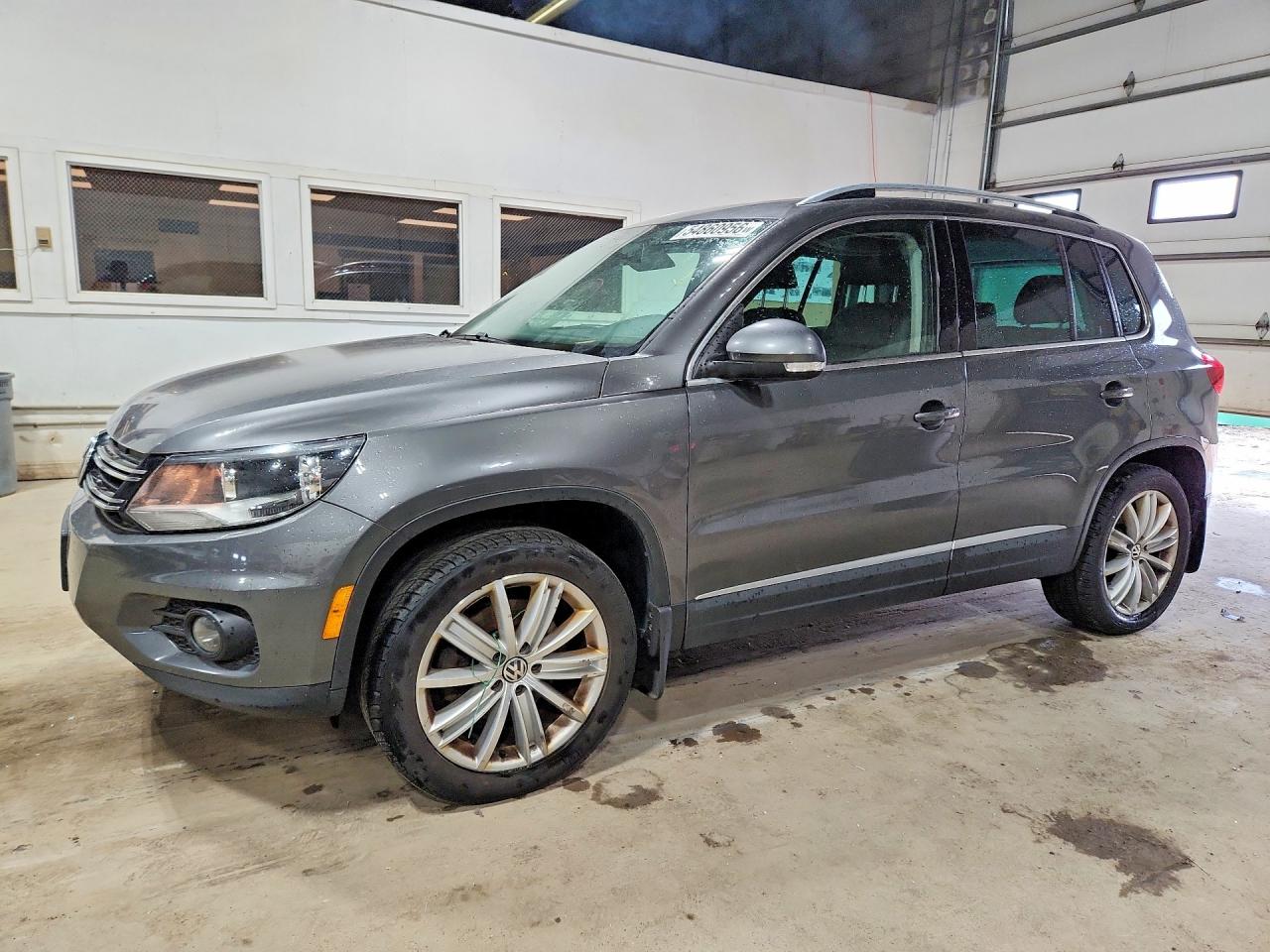 2015 Volkswagen Tiguan SEL, VIN WVGBV7AX1FW502497 — Water / flood