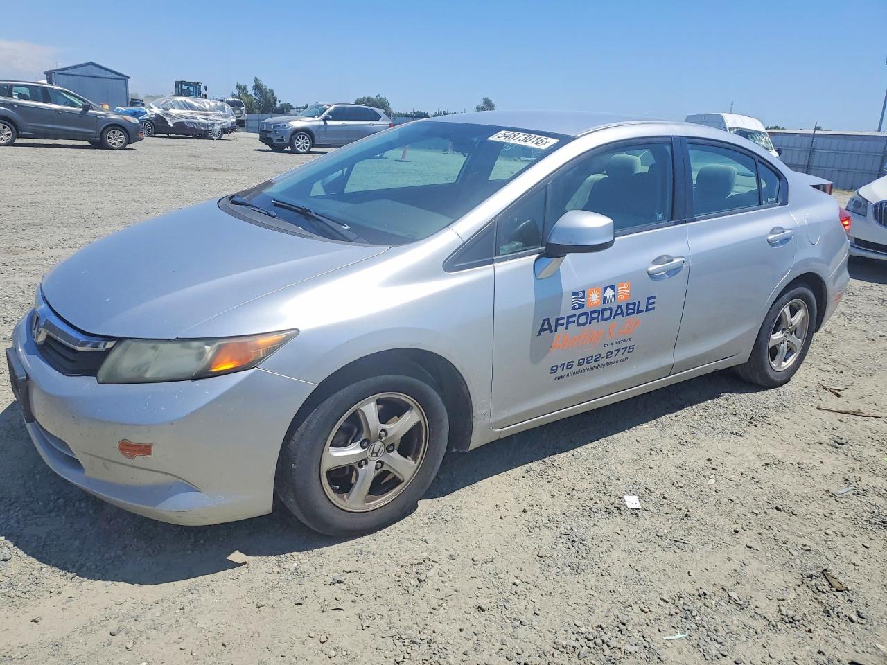 2012 Honda Civic CNG, VIN 19XFB5F58CE000599 — Minor dents and scratches