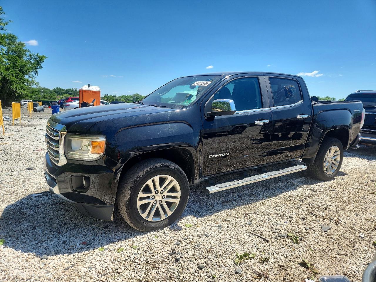 2016 GMC Canyon 4WD SLT, VIN 1GTP6DE14G1321419 — Minor dents and scratches