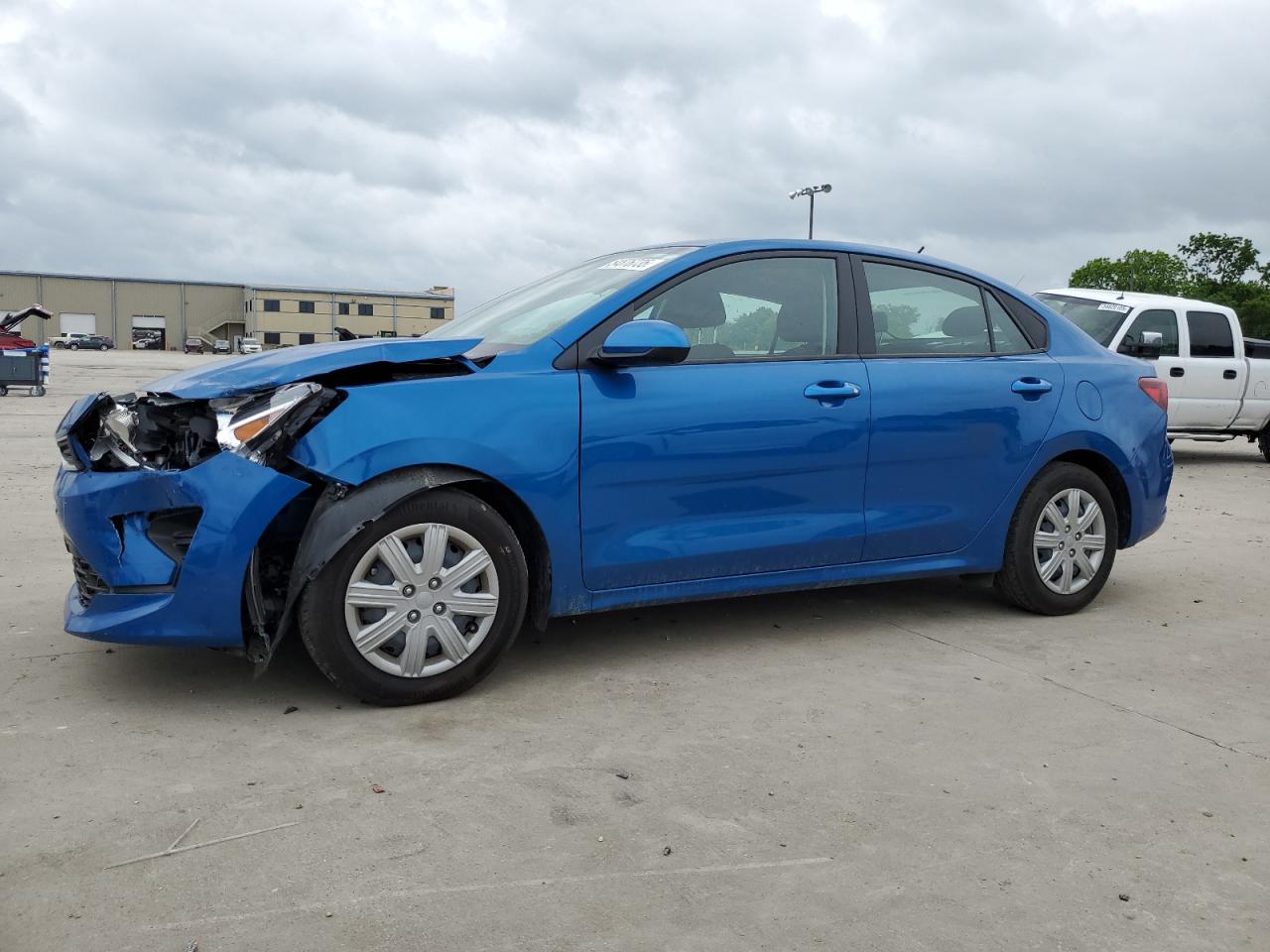 2023 Kia Rio S, VIN 3KPA24AD7PE525890 — Front end
