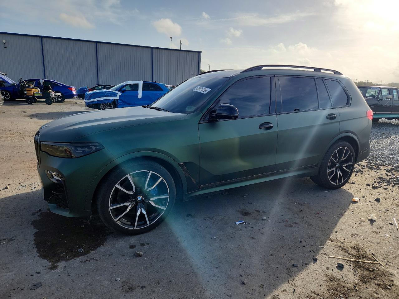 2019 BMW X7 xDrive50i, VIN 5UXCX4C53KLS37881 — Minor dents and scratches