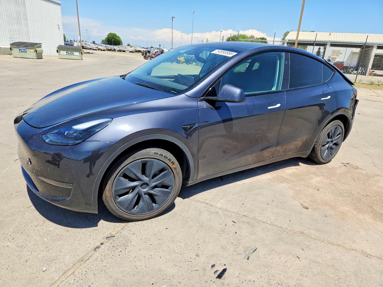 2024 Tesla Model Y, VIN 7SAYGDED9RF111519 — Rear end