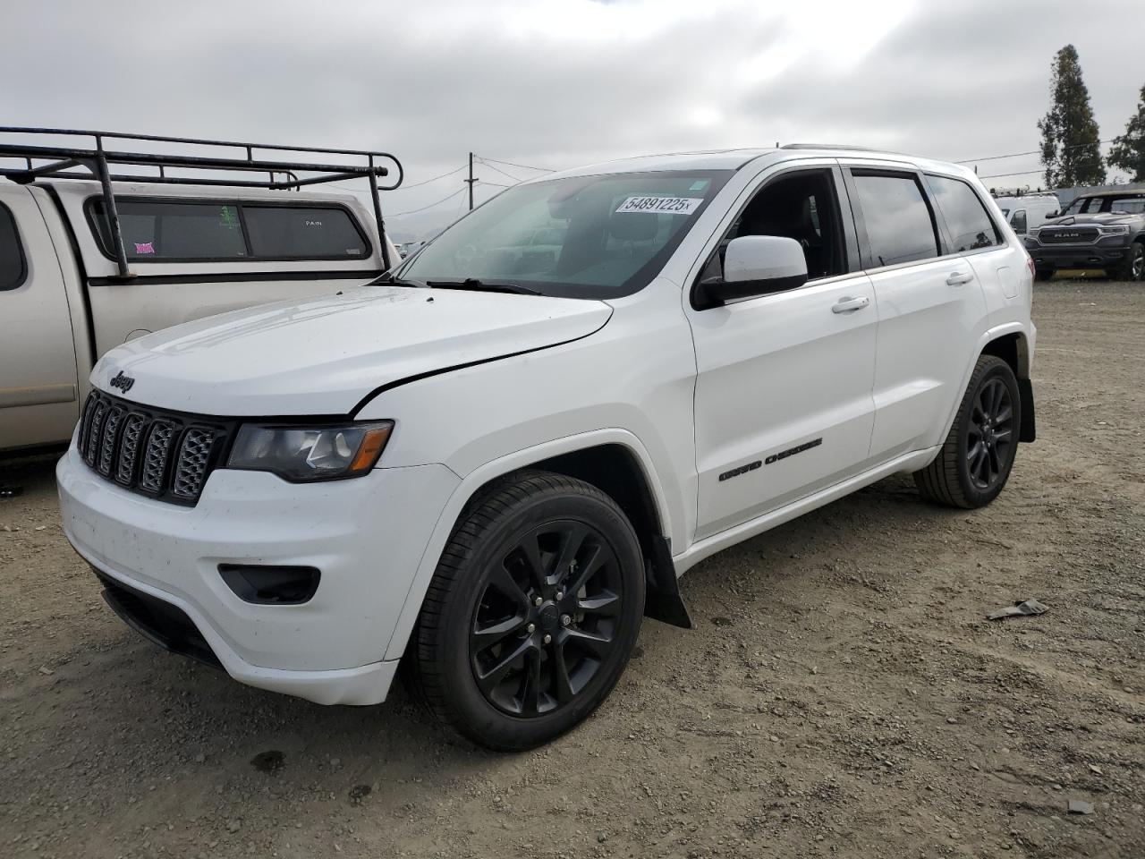 2017 Jeep Grand Cherokee Laredo, VIN 1C4RJEAG2HC702859 — Partial repair