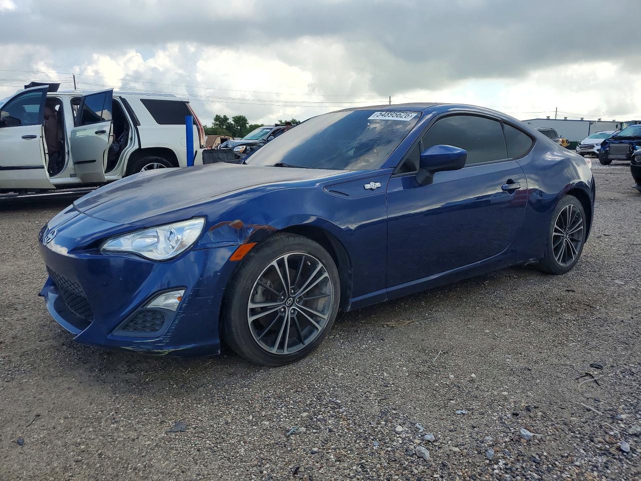 2015 Scion FR-S, VIN JF1ZNAA10F8709372 — Бок