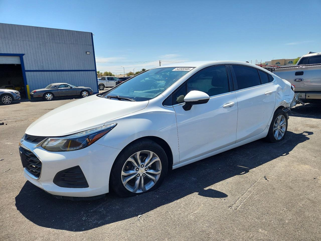 2019 Chevrolet Cruze LT, VIN 1G1BE5SM9K7131115 — Зад