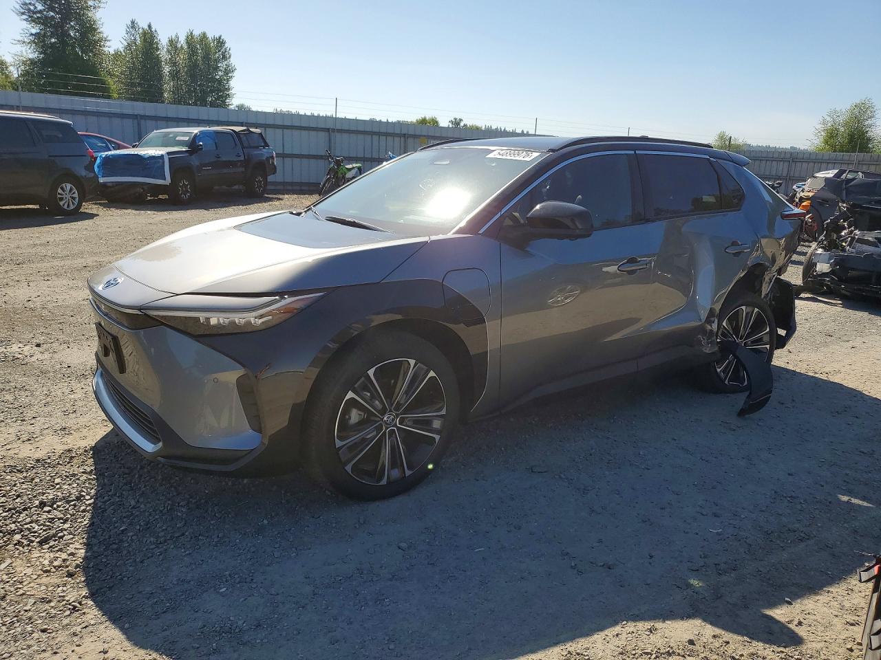 2023 Toyota bZ4X Limited, VIN JTMAAAAA3PA012520 — Side