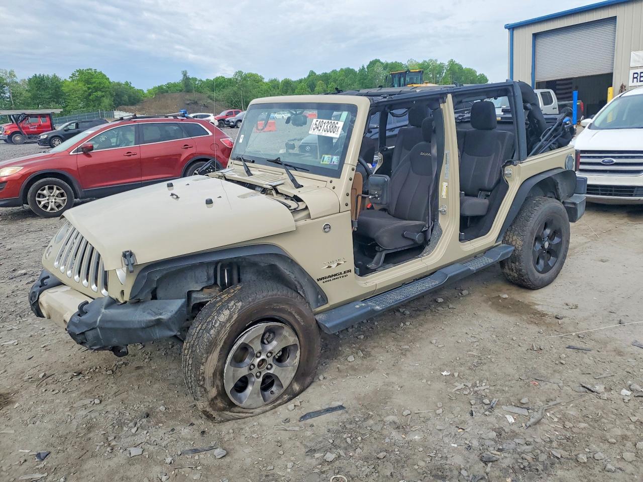 2017 Jeep Wrangler Unlimited Sahara, VIN 1C4HJWEG4HL675112 — Front end