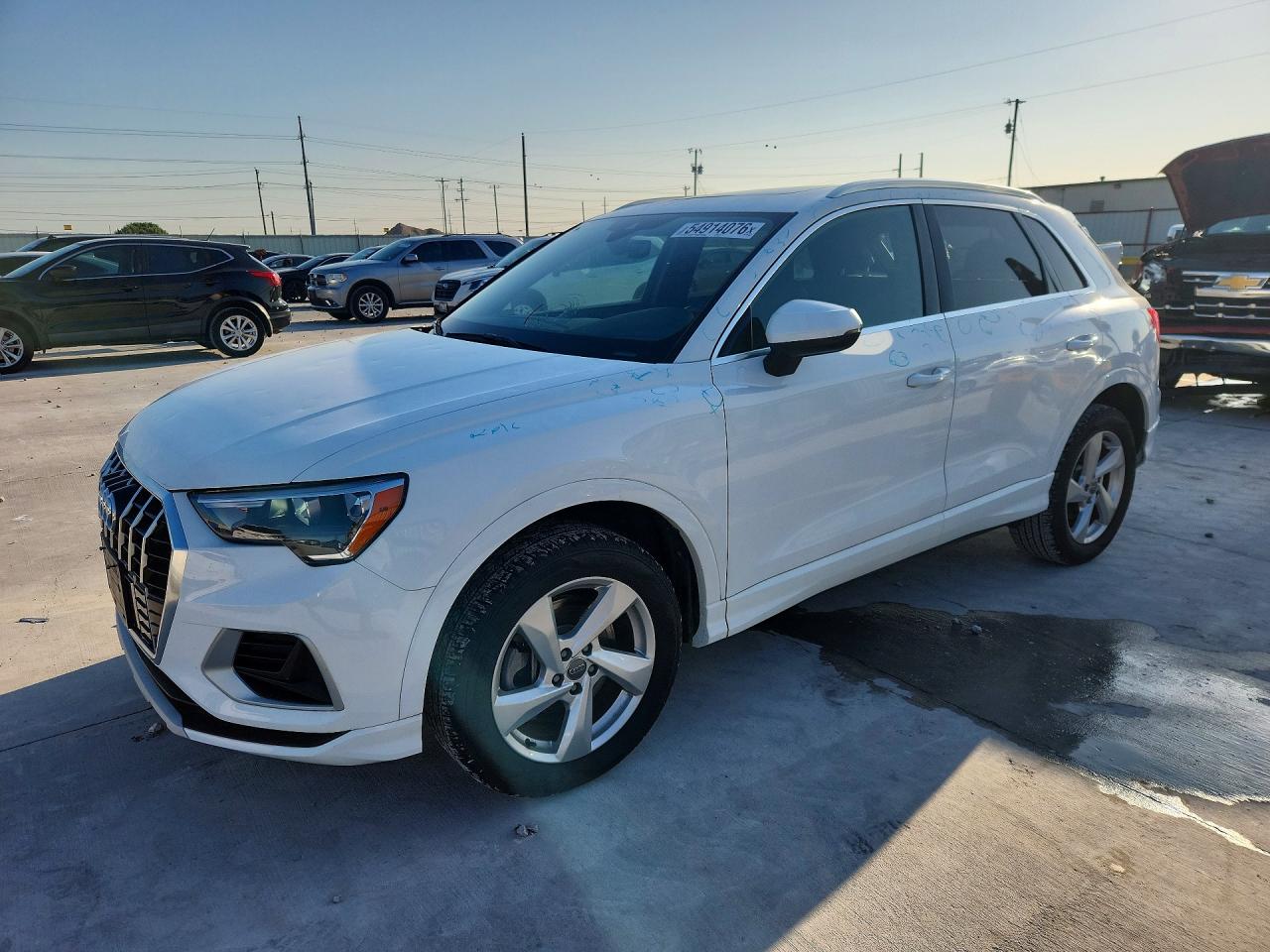 2020 Audi Q3 Premium, VIN WA1AECF35L1032265 — Hail