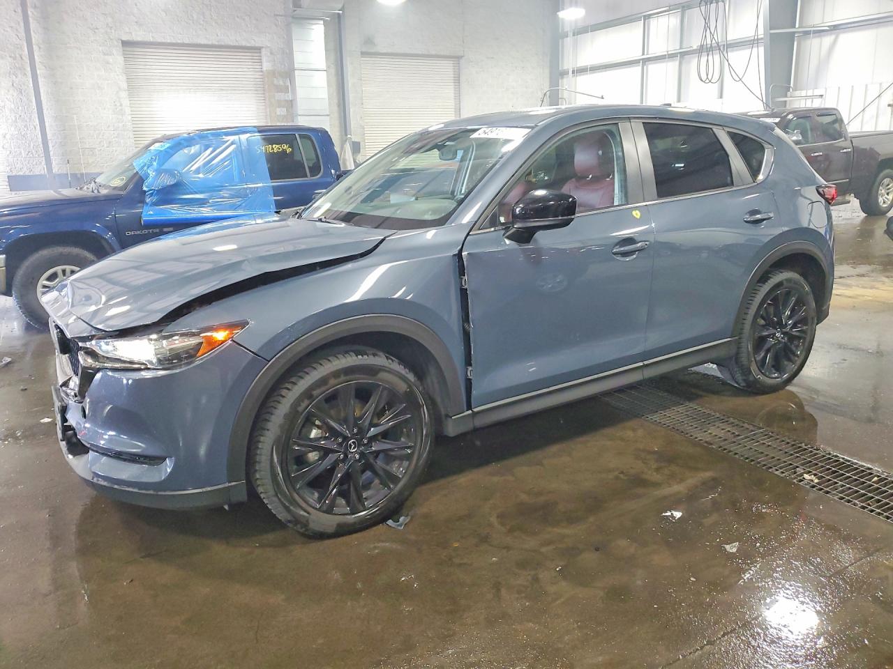 2021 Mazda CX-5 Touring, VIN JM3KFBCM9M0452981 — Front end