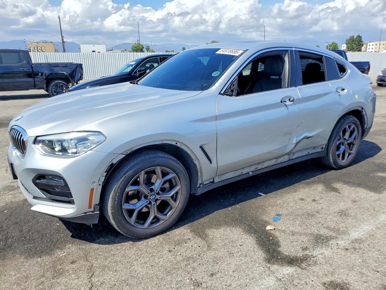 2021 BMW X4 xDrive30i, VIN 5UX2V1C08M9H49000 — Side