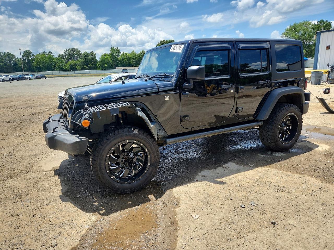 2016 Jeep Wrangler Unlimited Sport RHD, VIN 1C4BJWKG4GL293638 — Front end