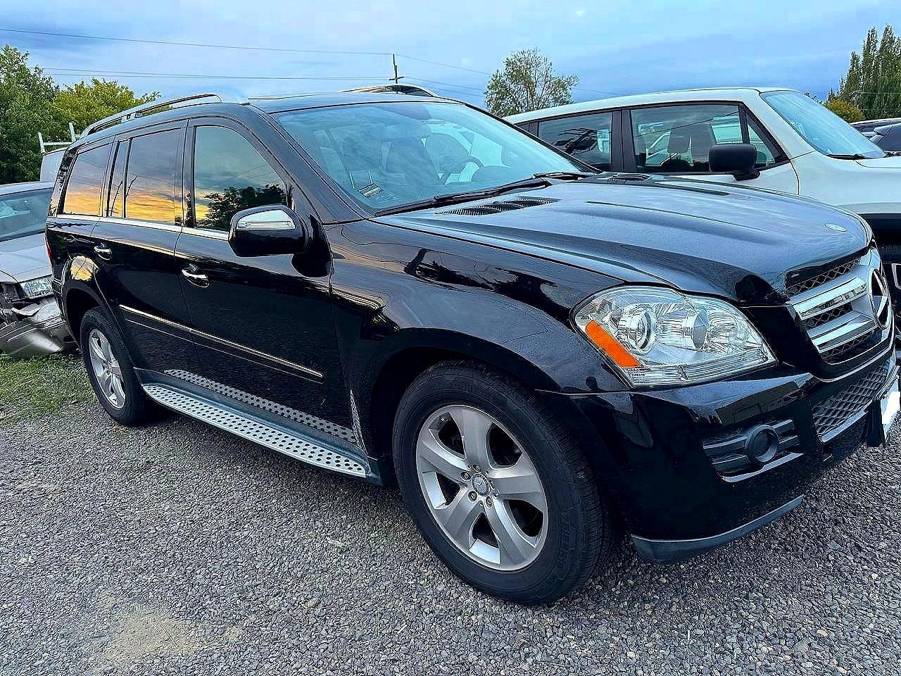2010 Mercedes-Benz GL 450, VIN 4JGBF7BE0AA592127 — Ранее повреждён