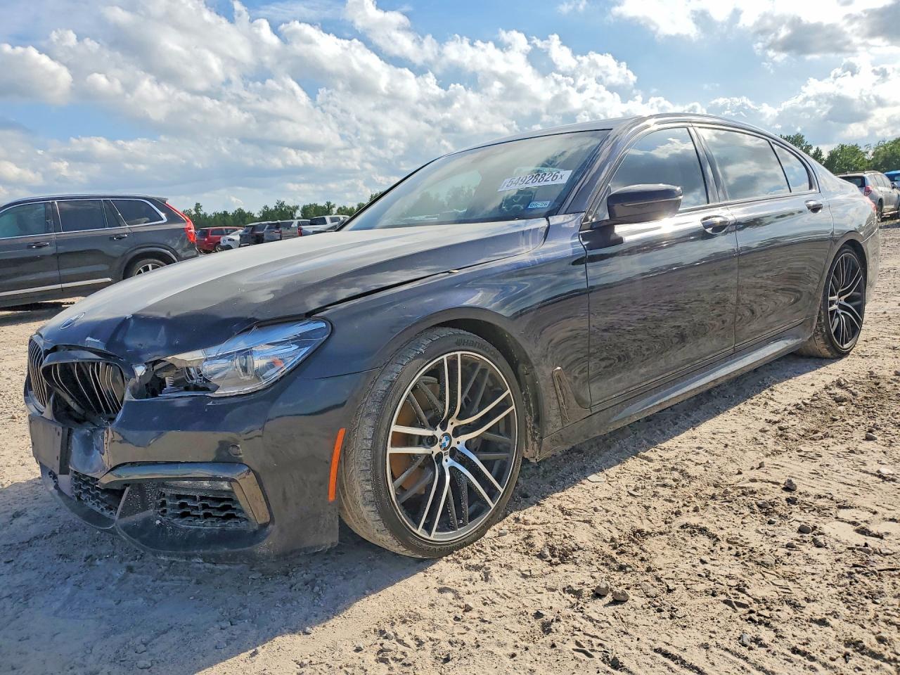 2016 BMW 7 Series 740i, VIN WBA7E2C52GG739078 — Front end