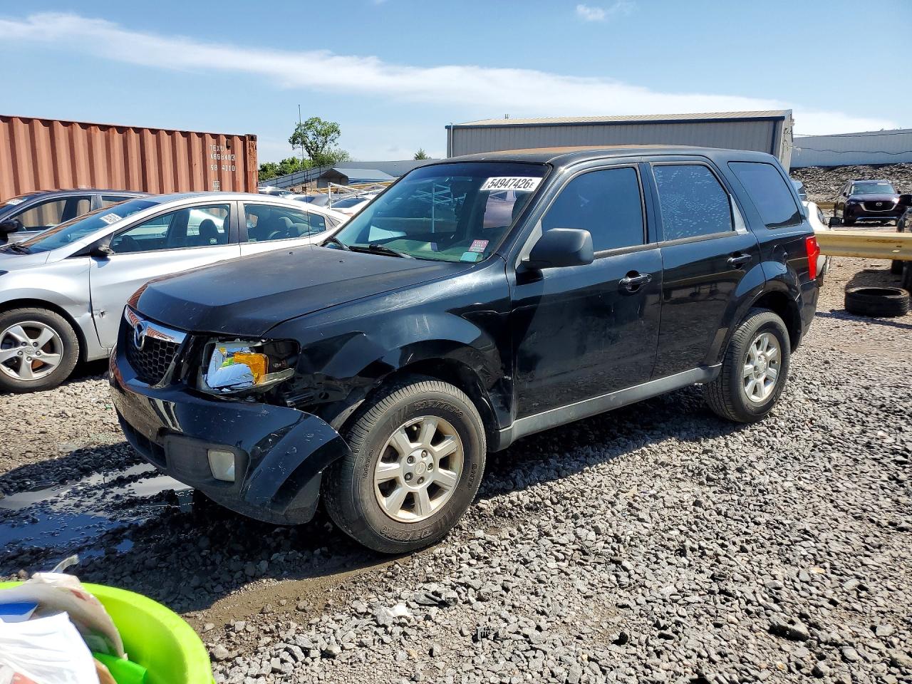 2010 Mazda Tribute Touring, VIN 4F2CY0C76AKM09284 — Front end