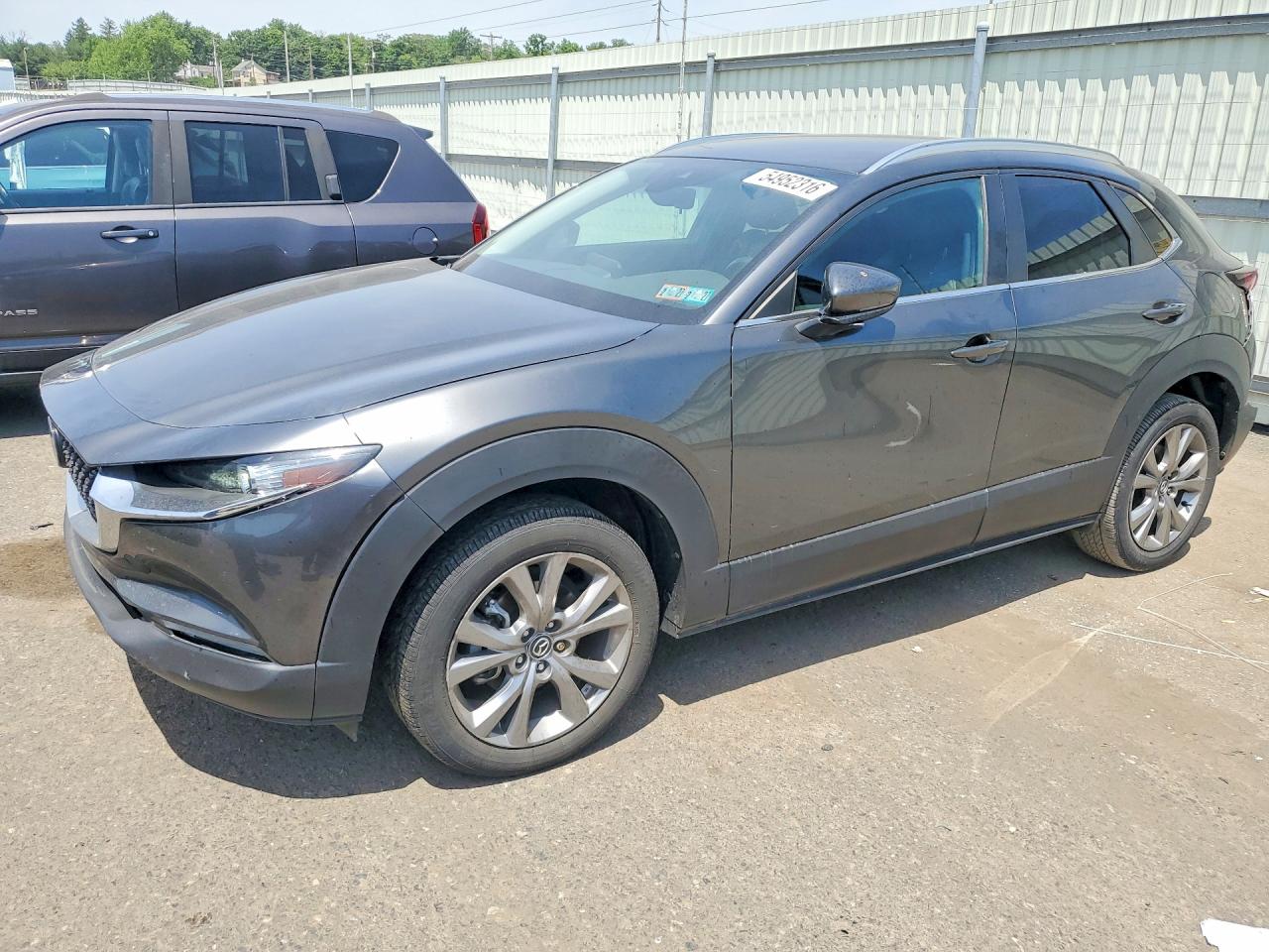 2023 Mazda CX-30 S Select, VIN 3MVDMBBM8PM511334 — Rear end
