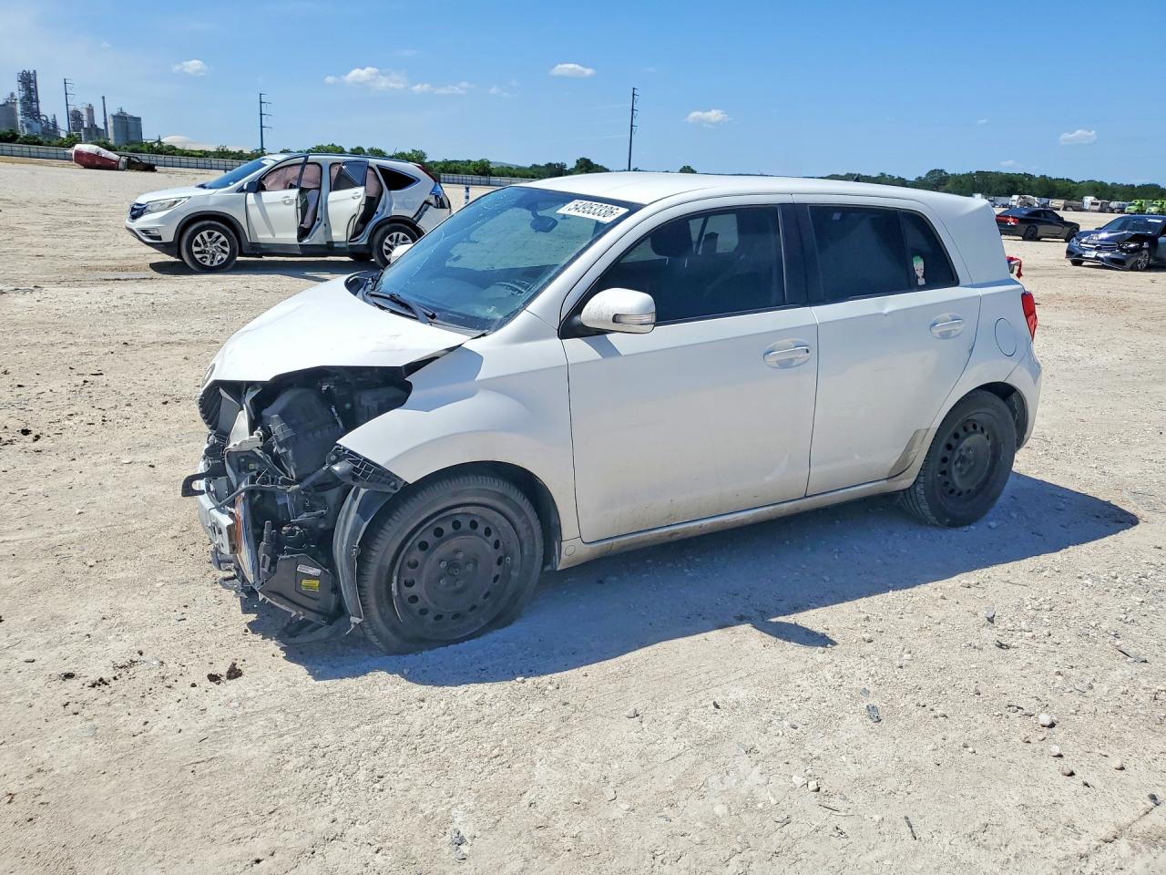 2012 Scion xD, VIN JTKKU4B4XC1027685 — Front end