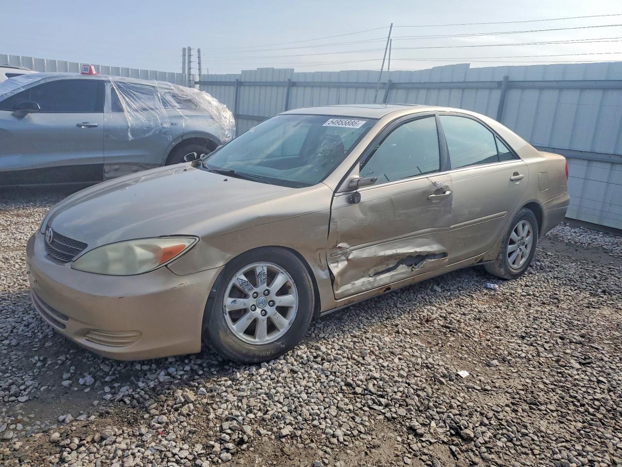2002 Toyota Camry LE, VIN 4T1BF30K42U503094 — Side