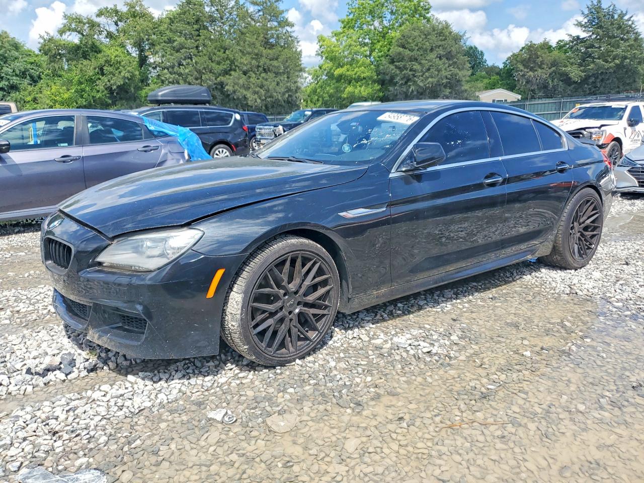 2013 BMW 6 Series 650i xDrive, VIN WBA6B4C54DDG67820 — Minor dents and scratches