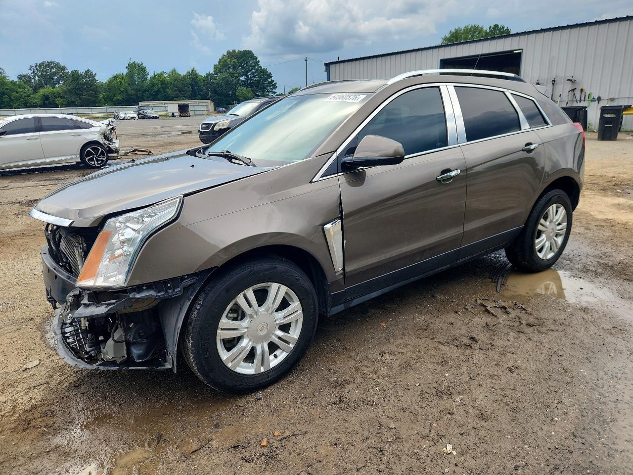 2015 Cadillac SRX Luxury Collection, VIN 3GYFNBE38FS620018 — Front end