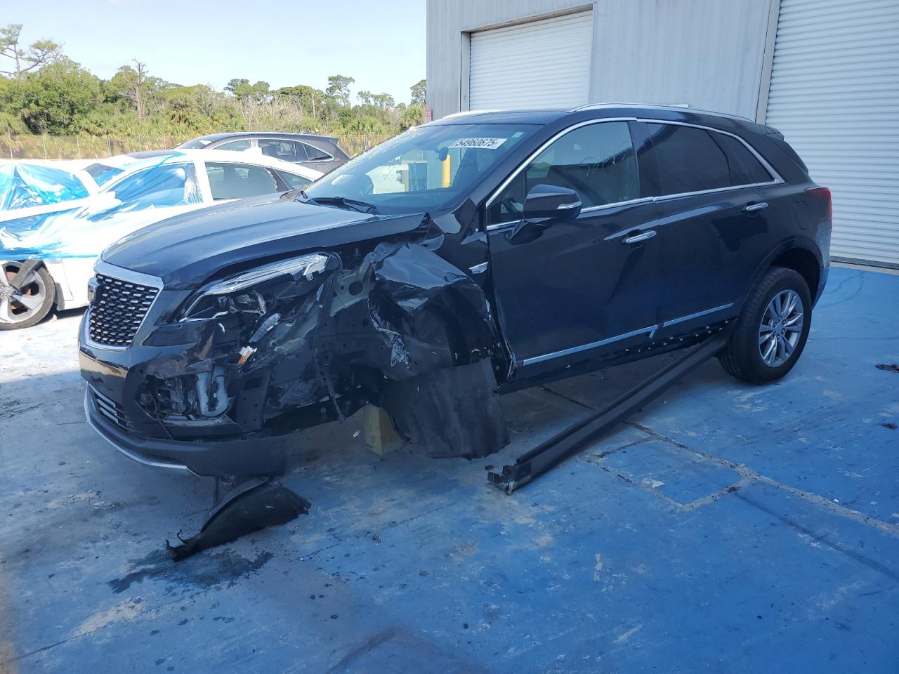 2022 Cadillac XT5 FWD Premium Luxury, VIN 1GYKNCRS7NZ104983 — Undercarriage