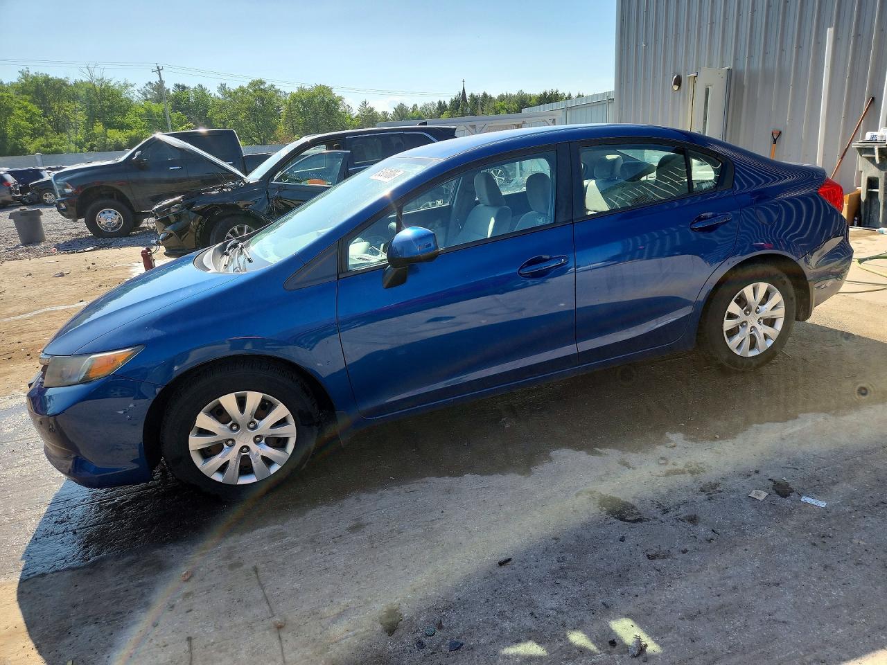 2012 Honda Civic LX, VIN 2HGFB2F58CH511055 — Undercarriage