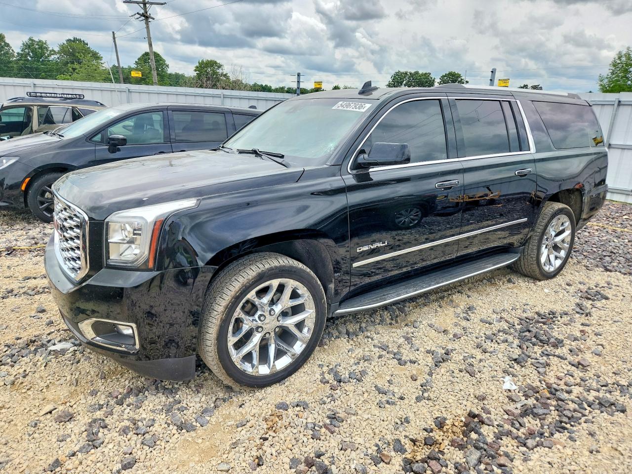 2018 GMC Yukon XL Denali, VIN 1GKS2HKJ6JR101374 — Hail