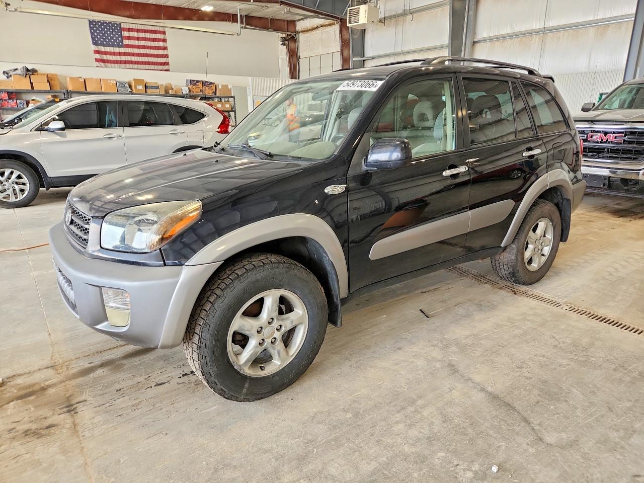 2001 Toyota RAV4, VIN JTEHH20V610124788 — Side