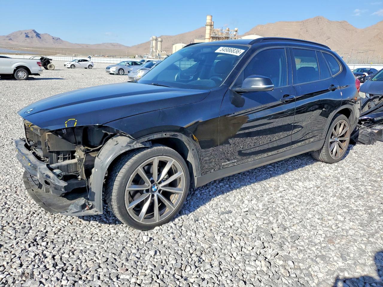 2015 BMW X1 sDrive28i, VIN WBAVM1C59FVZ94163 — Front end