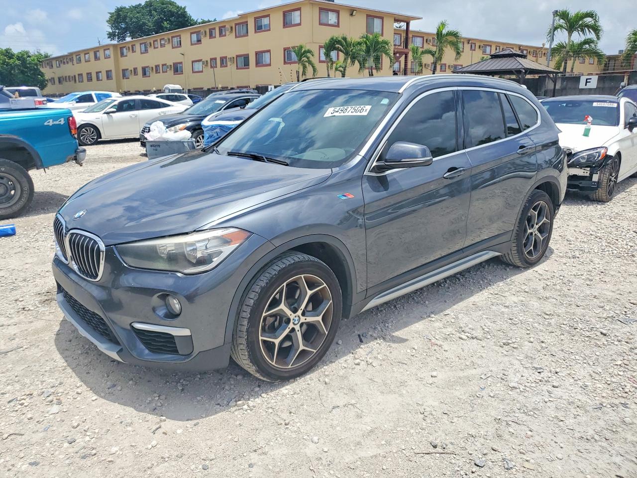 2018 BMW X1 sDrive28i, VIN WBXHU7C32J5L06565 — Rear end