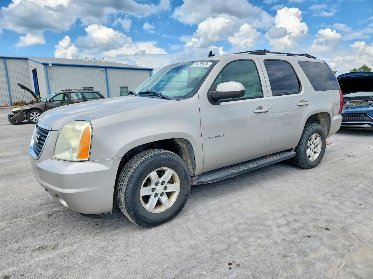 2007 GMC Yukon SLE, VIN 1GKFK13097J140904 — Hail