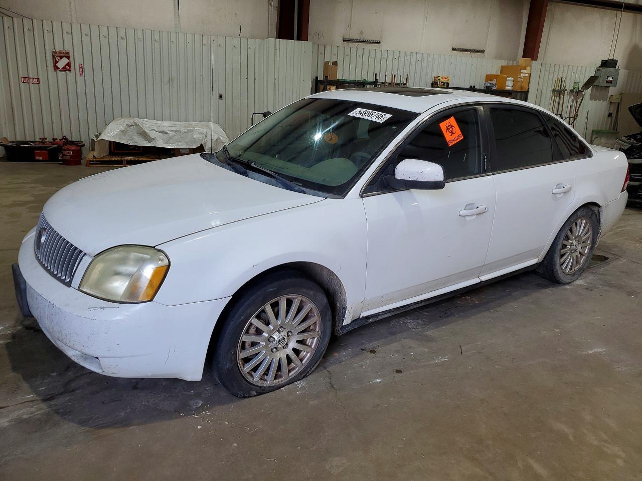 2007 Mercury Montego Premier, VIN 1MEHM42167G612241 — Зад