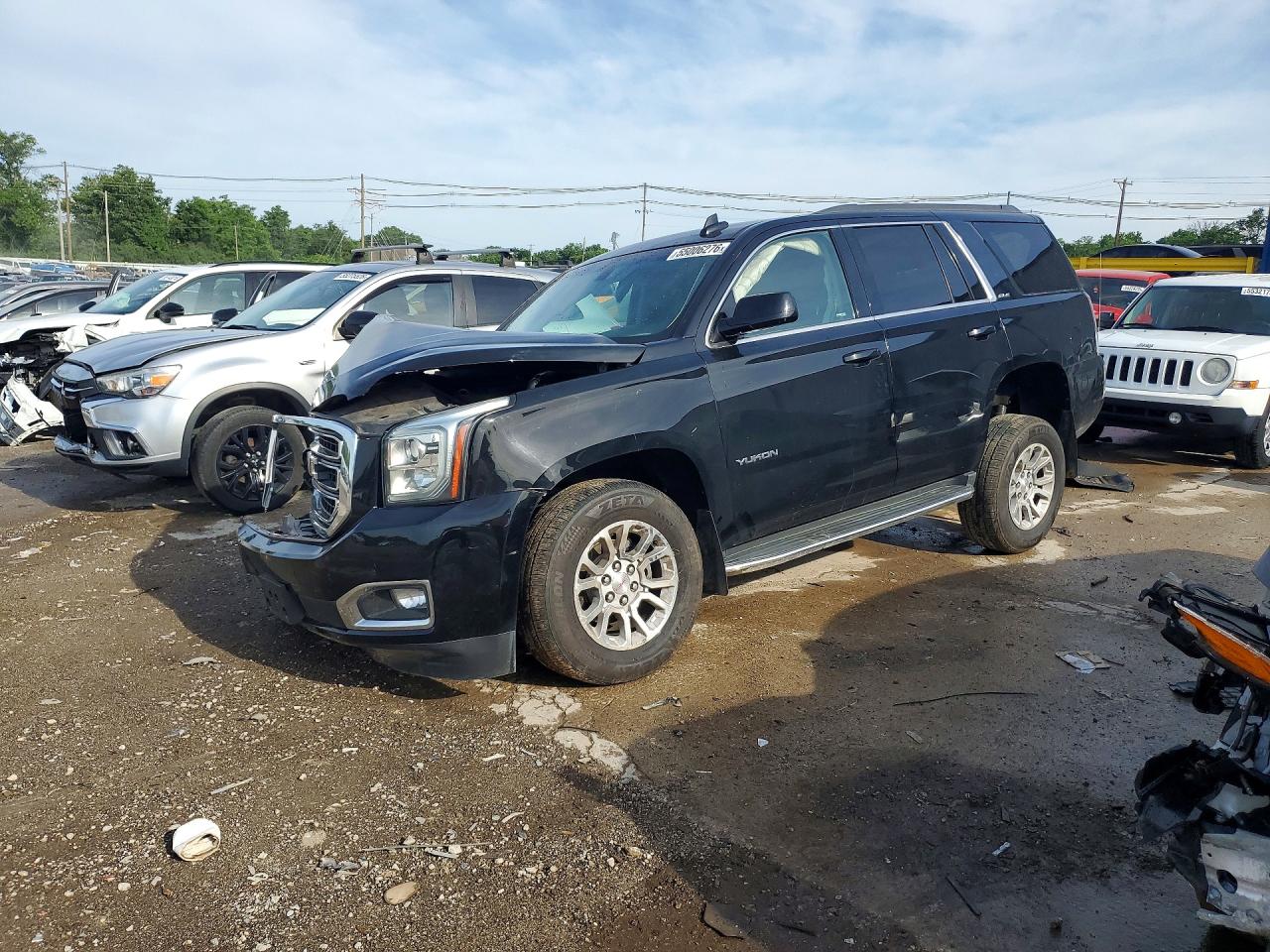2016 GMC Yukon SLE, VIN 1GKS2AKC0GR176993 — Front end